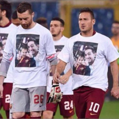 The players honor the two fans who died. 