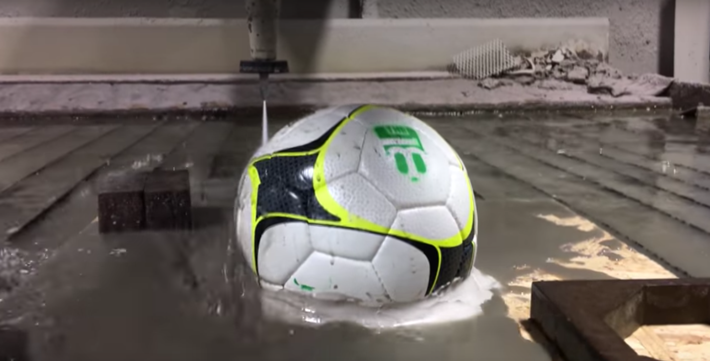 Cheap Vs. Expensive Footballs Cut In Half With Waterjet 